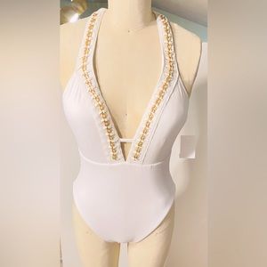 White Kenneth Cole one piece swimsuit. Gold chain detail.